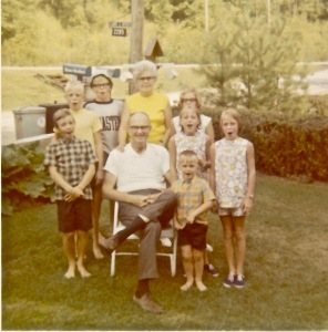 Grandma and Grandpa with their grandchildren. Taken in 1970, the last summer Grandpa was with us and 50 years after his high school basketball picture. This picture is now almost 50 years old and causes me to consider Wordsworth's hope in the poem "We are Seven" .